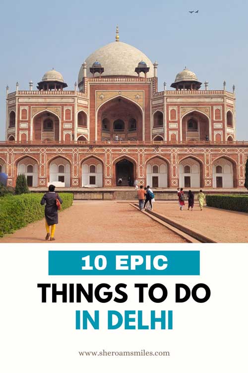 Humayun'S Tomb With A Dome And A Group Of People Walking In Front Of It