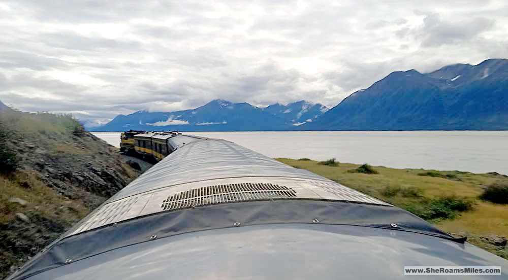 Alaska Train Going Through A Lake