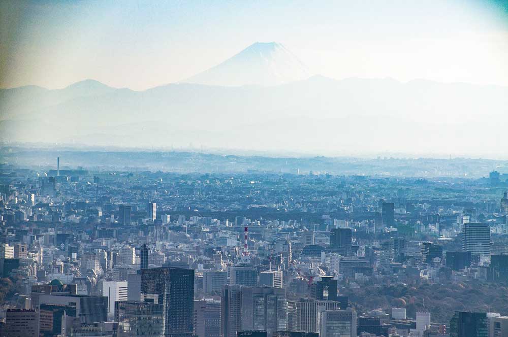 A City With A Mountain In The Background