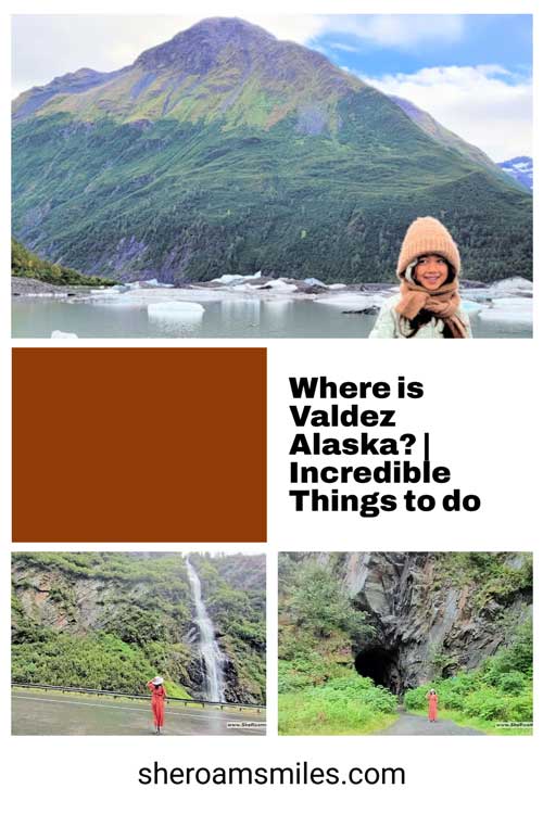 A Woman In A Hat And Scarf In Front Of A Waterfall